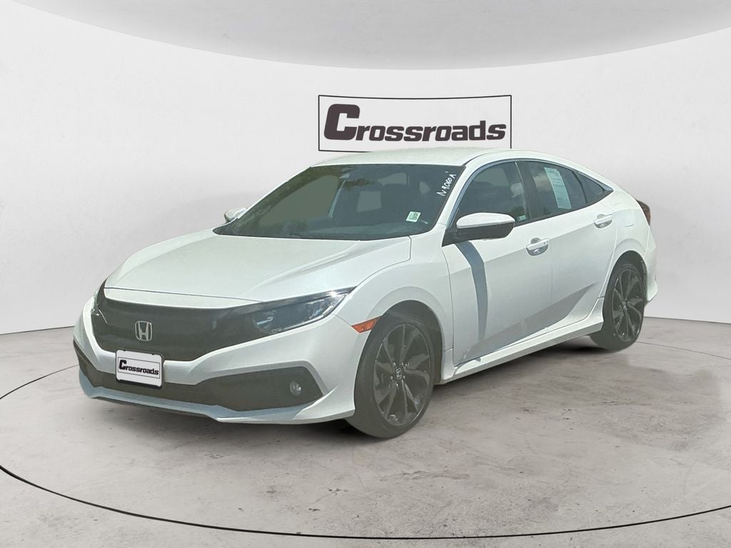 2021 Honda Civic Sedan Sport in White — front three-quarter view