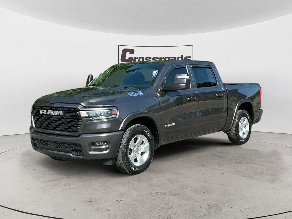 2025 RAM 1500 Big Horn in Granite Crystal M — front three-quarter view