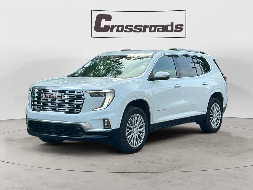 2025 GMC Acadia Denali in Summit White — front three-quarter view