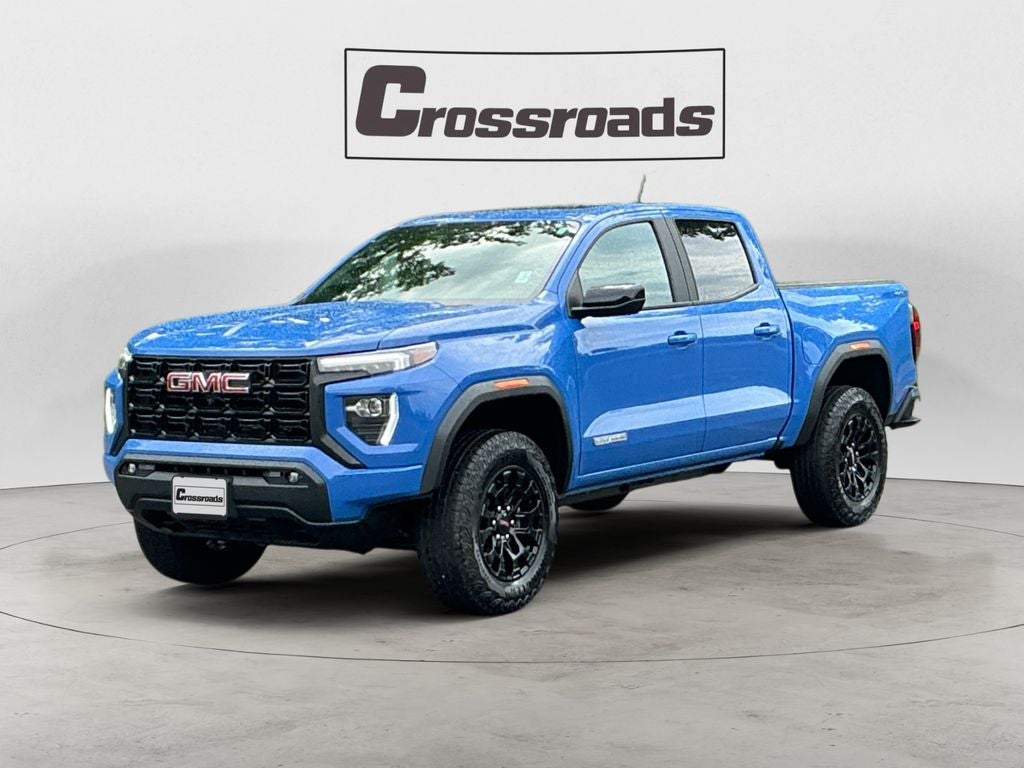 2026 GMC Canyon Elevation in Rapids Metallic — front three-quarter view