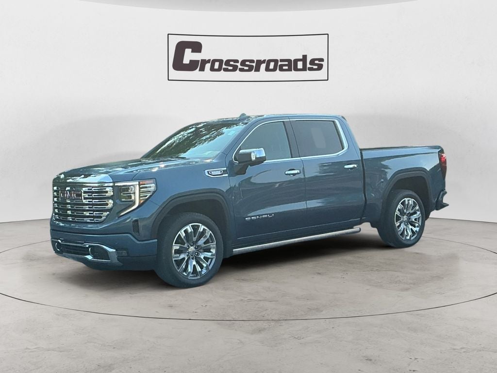 2025 GMC Sierra 1500 Denali in Downpour Metallic — front three-quarter view