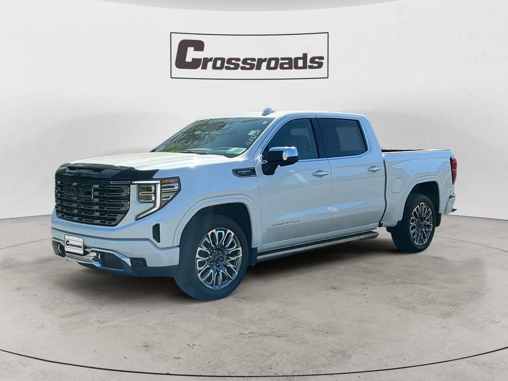 2025 GMC Sierra 1500 Denali Ultimate in White Frost Tricoat — front three-quarter view