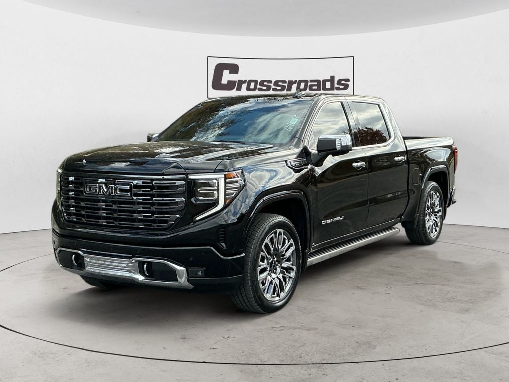 2025 GMC Sierra 1500 Denali Ultimate in Onyx Black — front three-quarter view