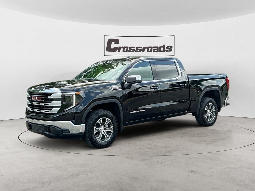 2026 GMC Sierra 1500 SLE in Onyx Black — front three-quarter view